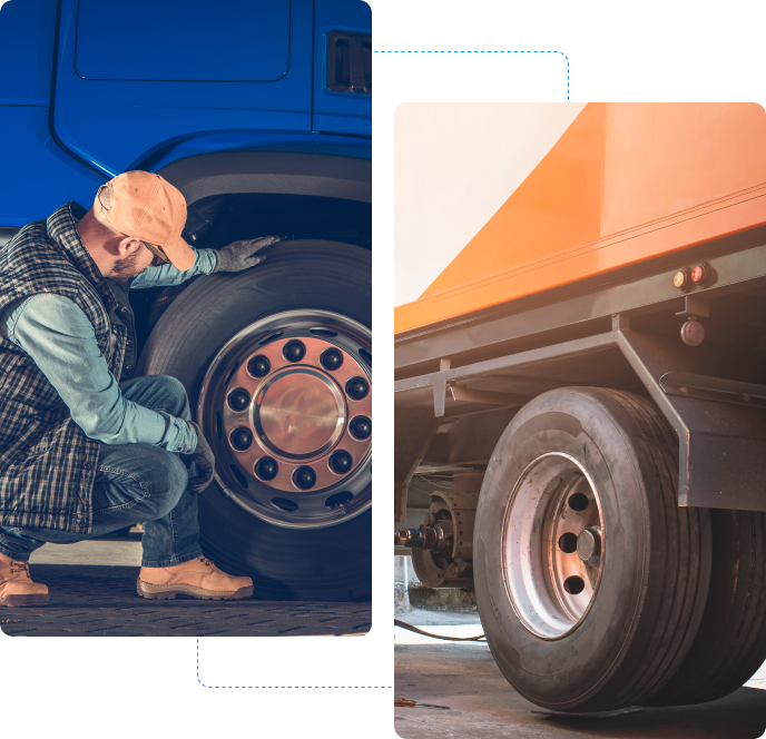 Man inspecting large truck wheels.